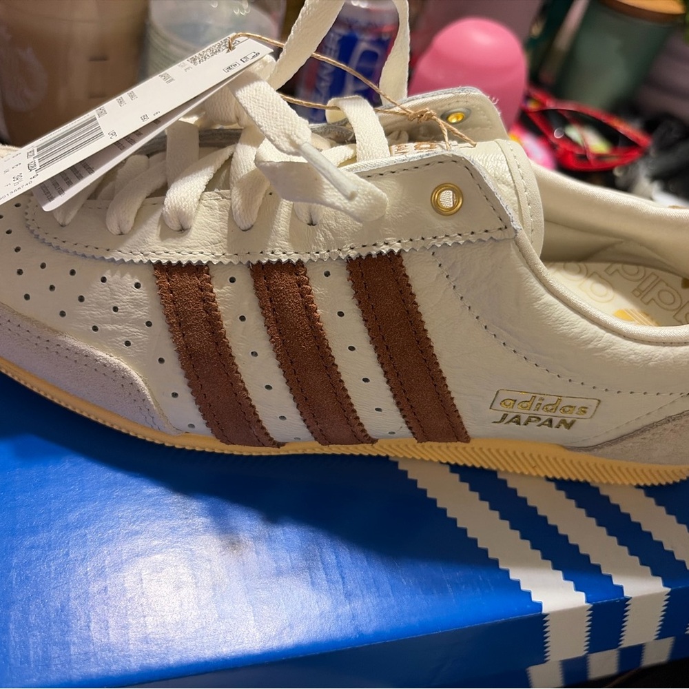 Brand new  in box women’s sz 7 1/2 adidas Off-White Sneakers with Brown Stripes
